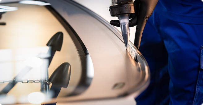 Man wiping car windshield
